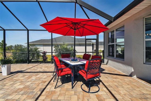 5226 Lake Venice Dr, Wimauma, FL 33598 - view of patio / terrace with glass enclosure and outdoor dining area
