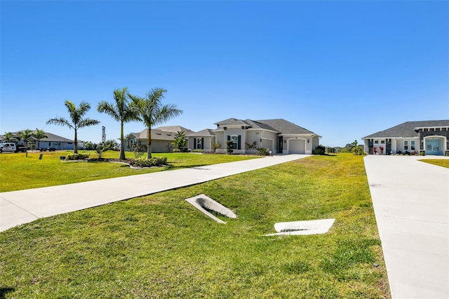 5226 Lake Venice Dr, Wimauma, FL 33598 - exterior space with a residential view, driveway, an attached garage, and a front yard