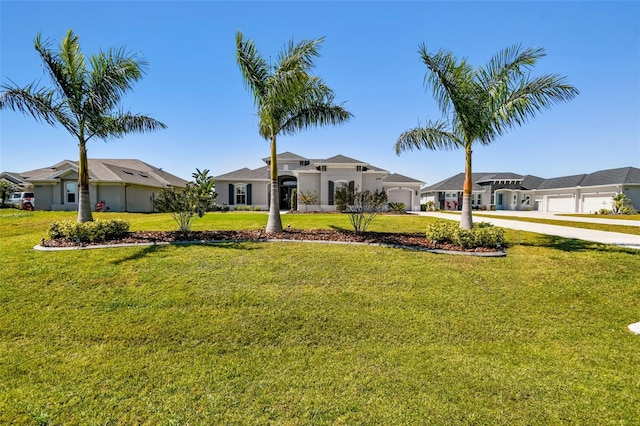 5226 Lake Venice Dr, Wimauma, FL 33598 - view of front of property featuring a garage, a residential view, a front lawn, and driveway