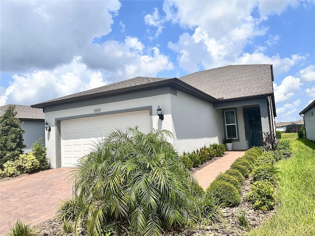 view of front of home with a garage