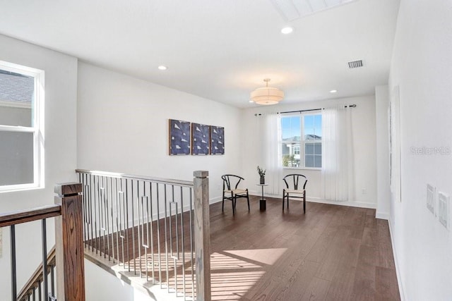 living area with dark wood-type flooring