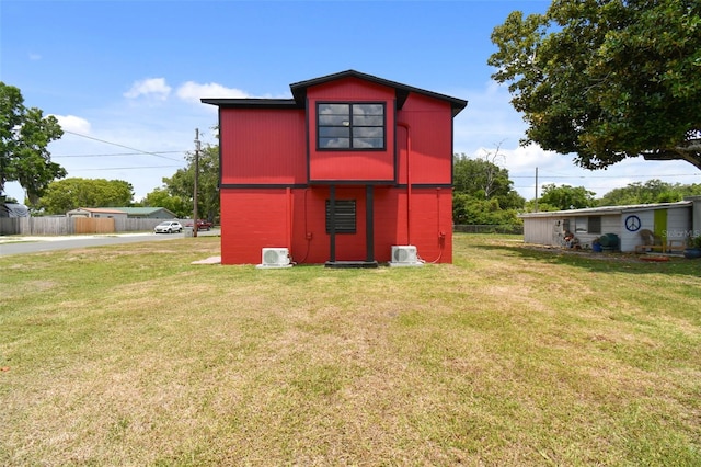 view of outdoor structure featuring a lawn