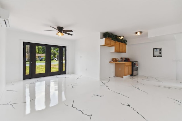 living room featuring ceiling fan and a wall unit AC