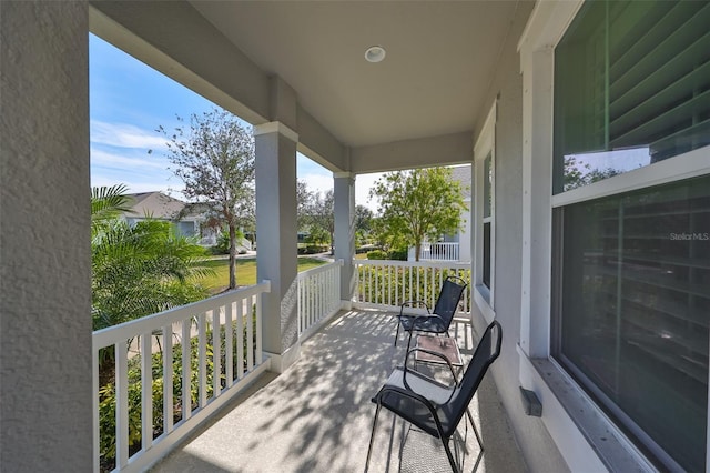 balcony featuring a porch