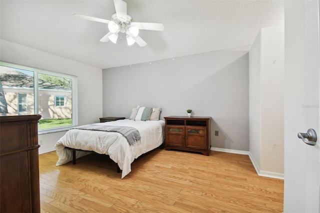 bedroom featuring ceiling fan and light hardwood / wood-style floors