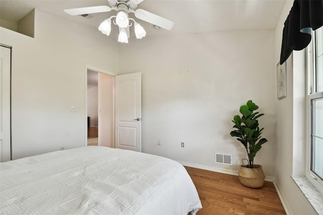 bedroom featuring ceiling fan and hardwood / wood-style floors