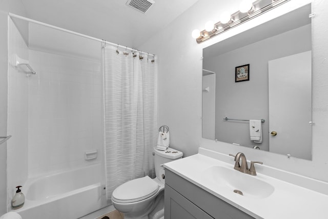 full bathroom featuring vanity, toilet, and shower / bathtub combination with curtain