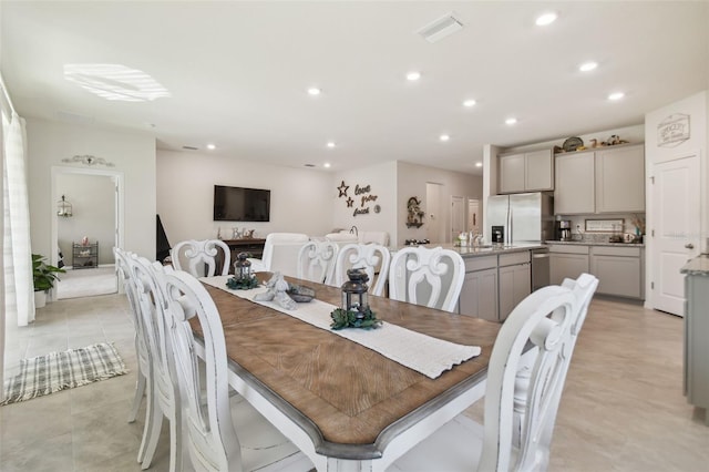 dining room featuring light tile patterned floors