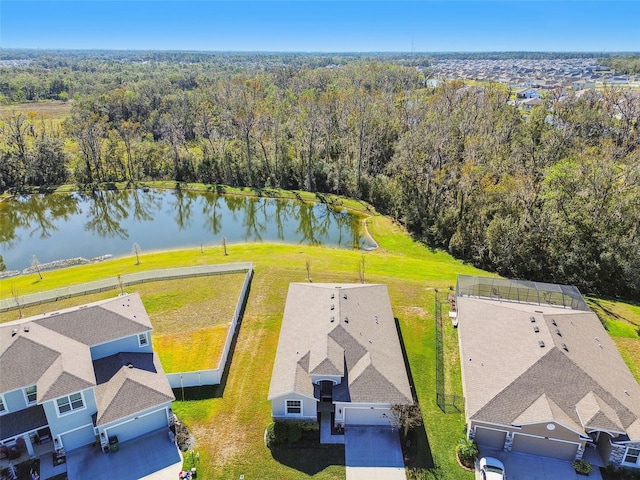 birds eye view of property with a water view