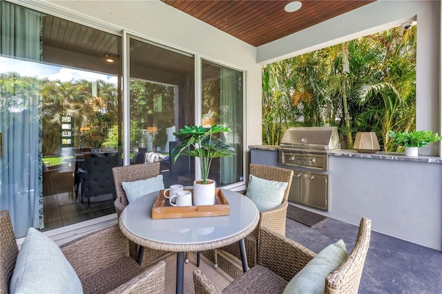 2246 Fiesta Dr, Sarasota, FL 34231 - sunroom / solarium featuring area for grilling and outdoor dining area