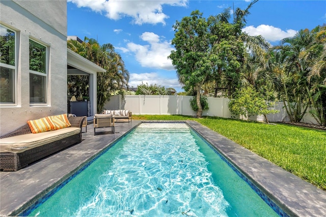2246 Fiesta Dr, Sarasota, FL 34231 - view of swimming pool featuring an outdoor living space, a fenced backyard, and a patio
