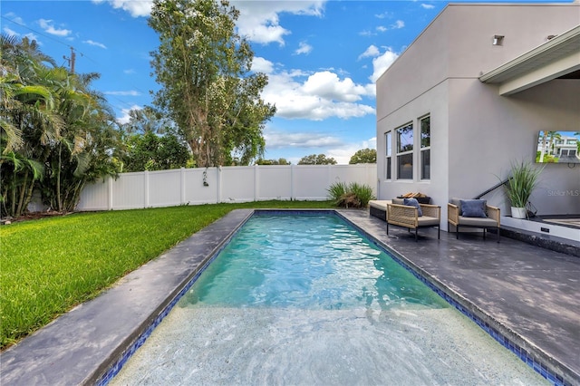 2246 Fiesta Dr, Sarasota, FL 34231 - view of swimming pool with a fenced backyard, a patio area, and an outdoor hangout area