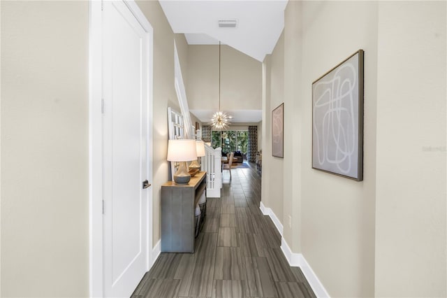 2246 Fiesta Dr, Sarasota, FL 34231 - hall featuring baseboards and a high ceiling