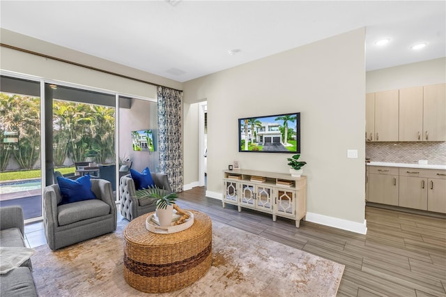 2246 Fiesta Dr, Sarasota, FL 34231 - living area featuring wood finished floors and recessed lighting