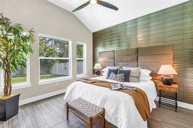 2246 Fiesta Dr, Sarasota, FL 34231 - bedroom with lofted ceiling and a ceiling fan