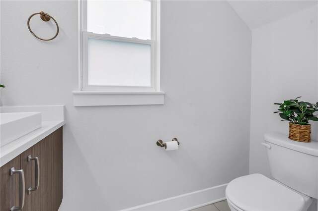 2246 Fiesta Dr, Sarasota, FL 34231 - half bathroom featuring vanity and toilet