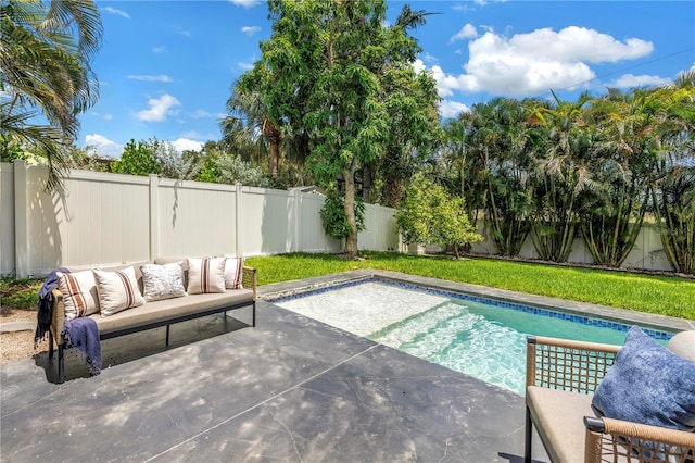 2246 Fiesta Dr, Sarasota, FL 34231 - view of swimming pool featuring an outdoor living space, a patio area, and a fenced backyard