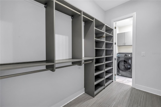 2246 Fiesta Dr, Sarasota, FL 34231 - walk in closet featuring washer / clothes dryer