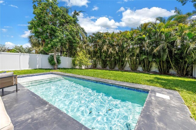 2246 Fiesta Dr, Sarasota, FL 34231 - view of swimming pool featuring a fenced backyard