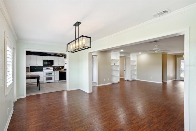 unfurnished living room featuring dark hardwood / wood-style flooring, ceiling fan with notable chandelier, and crown molding