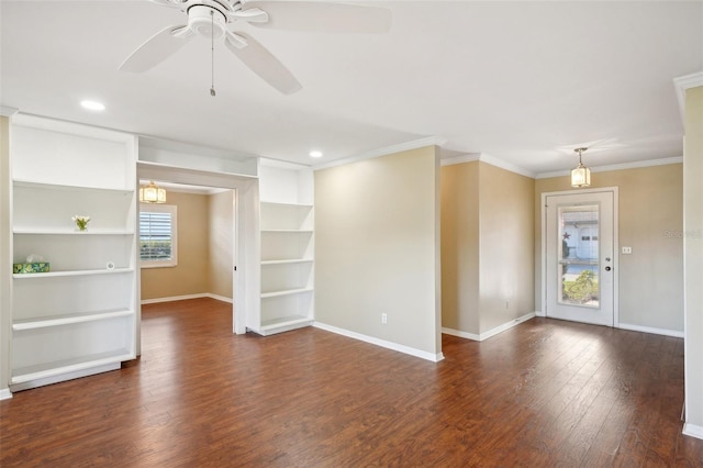 interior space featuring ceiling fan, dark wood-type flooring, and ornamental molding