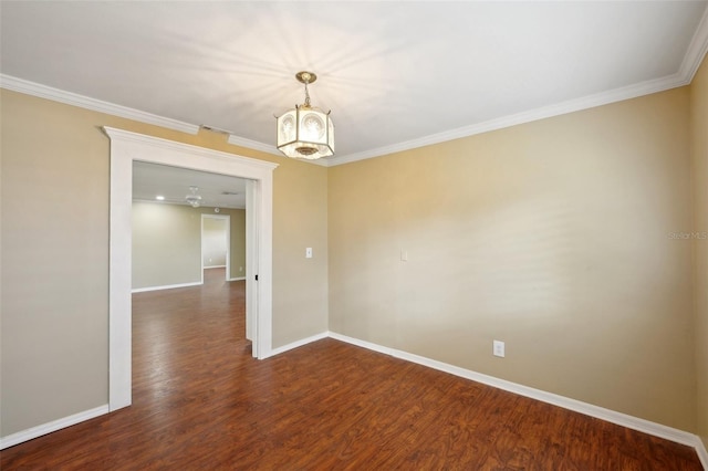 empty room with crown molding and dark wood-type flooring