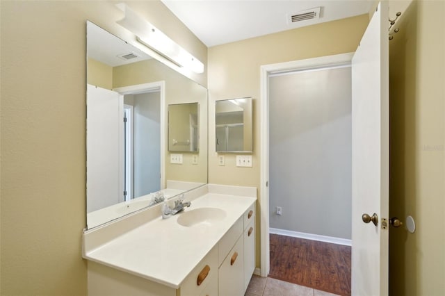 bathroom featuring vanity and tile patterned floors