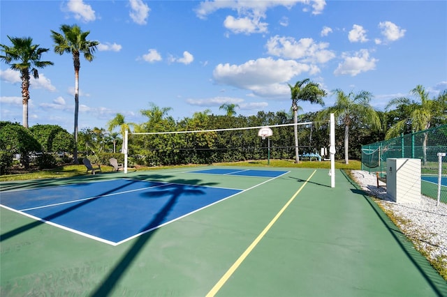 view of tennis court featuring basketball court