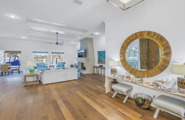 interior space featuring beam ceiling and hardwood / wood-style flooring