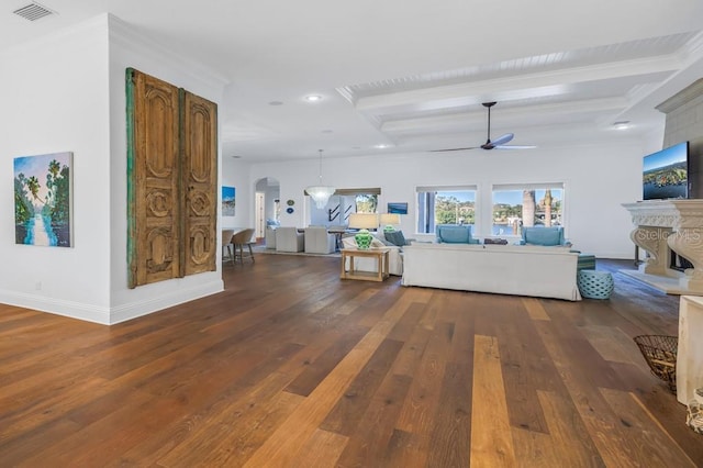 living room featuring ceiling fan, ornamental molding, and dark wood-type flooring