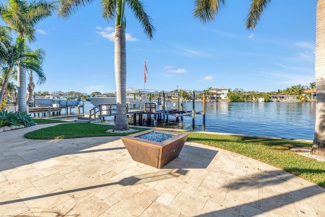 dock area with a water view