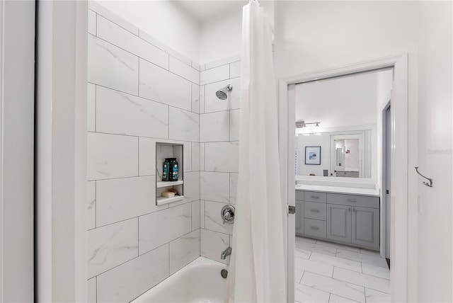 bathroom with vanity and shower / bath combination with curtain