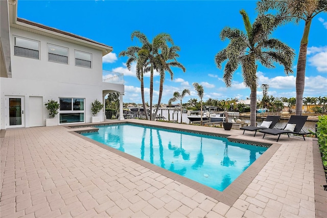 view of pool featuring a patio