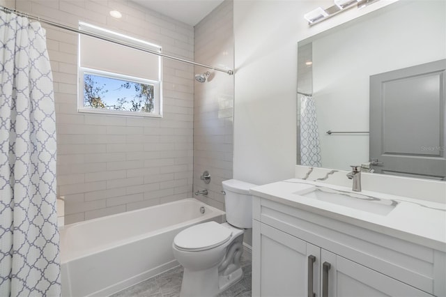 full bathroom with shower / bath combo, vanity, and toilet