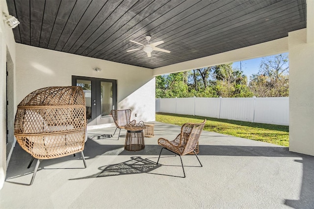 view of patio / terrace with french doors and ceiling fan