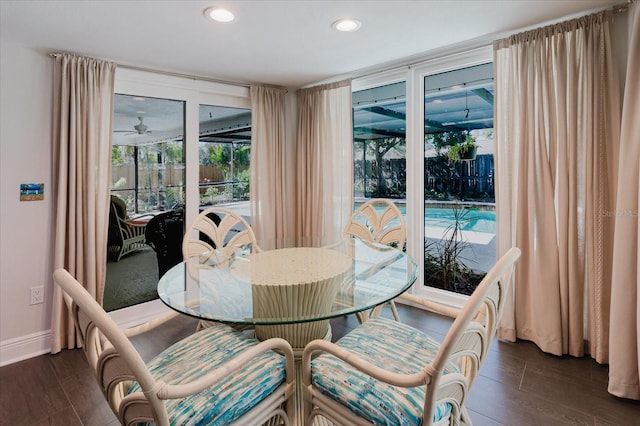 dining area with ceiling fan, baseboards, dark wood-type flooring, and recessed lighting