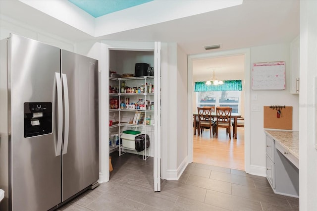 pantry featuring visible vents