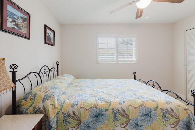 bedroom featuring a closet and ceiling fan