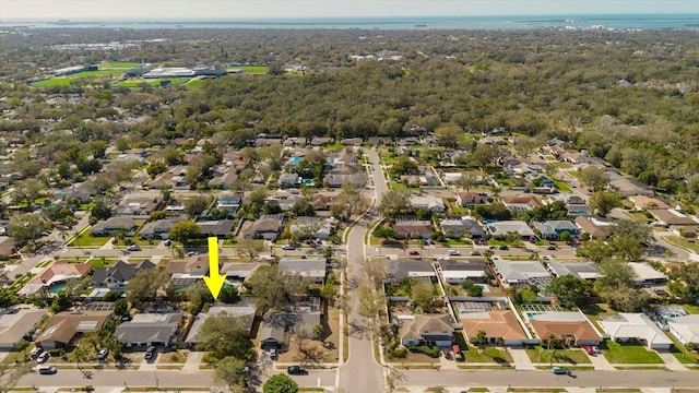 birds eye view of property with a residential view