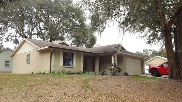 ranch-style home featuring a garage