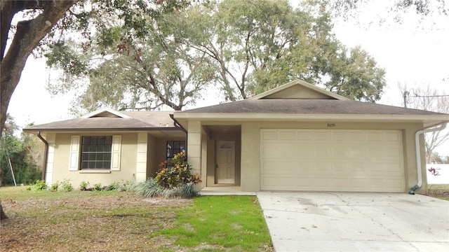 ranch-style house featuring a garage