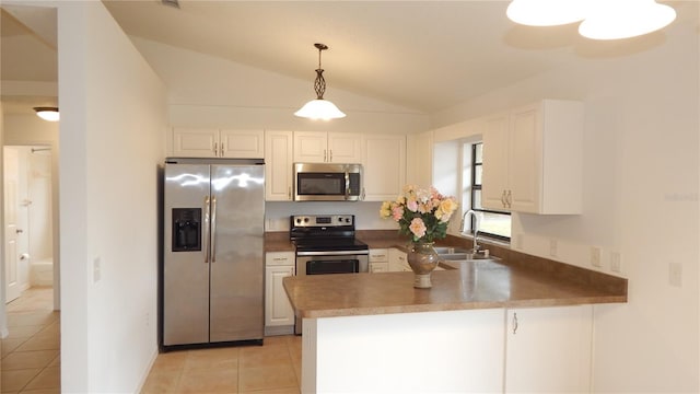 kitchen featuring lofted ceiling, sink, kitchen peninsula, white cabinetry, and stainless steel appliances