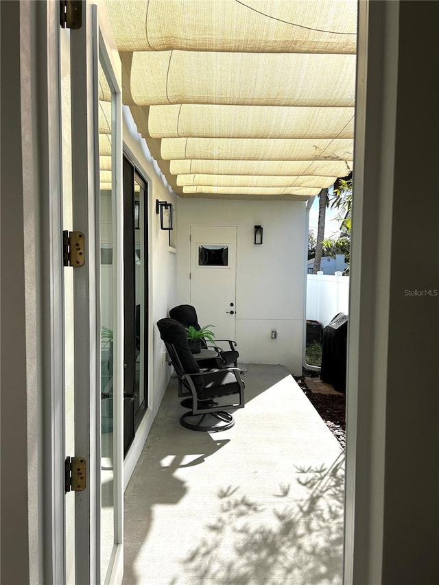 view of patio / terrace with fence