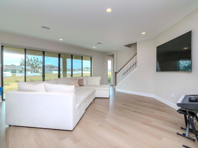 living room featuring light wood-type flooring