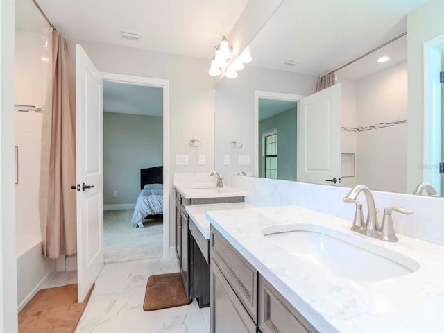 bathroom with shower / bath combo and vanity