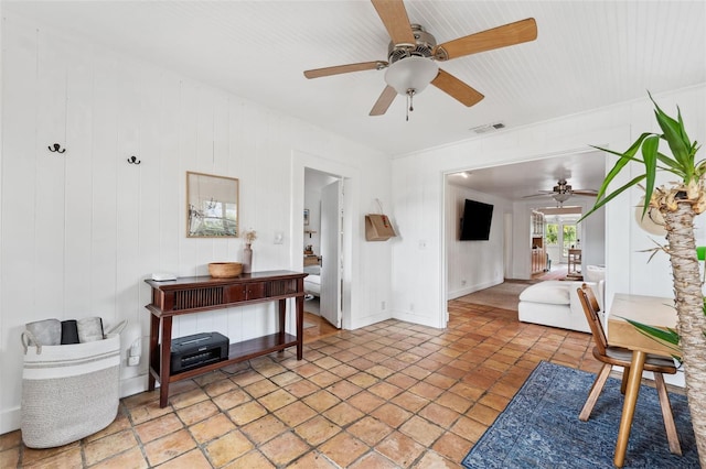 living room featuring ceiling fan