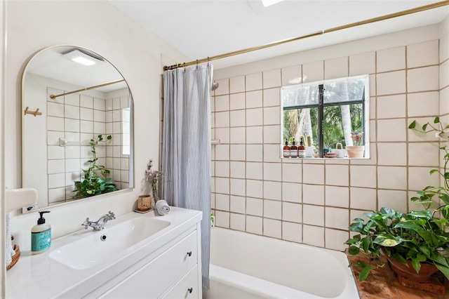 bathroom with vanity and shower / bathtub combination with curtain