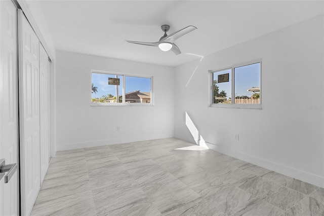 spare room featuring ceiling fan