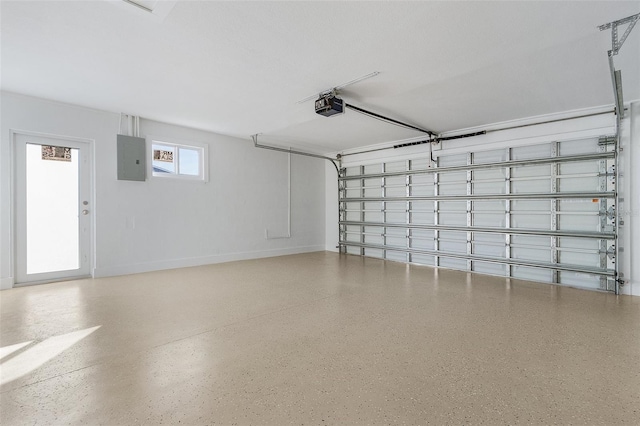 garage featuring electric panel and a garage door opener