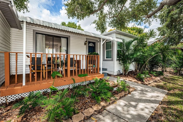 view of front of house featuring a wooden deck